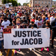 Protesters march with the family of Jacob Blake during a rally against racism and police brutality in Kenosha, Wisconsin, on August 29, 2020. - Demonstrations have been ongoing since Jacob Blake was shot by Kenosha Police officer Rusten Sheskey on August 23.